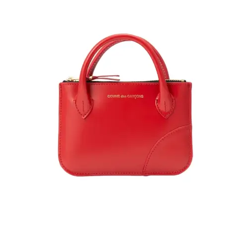 CDG Wallet Handles Line Red SA8100HA CDG Wallet Handles Line Red SA8100HA by Comme des Garçons – luxury red leather wallet